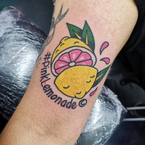Traditional tattoo arm tattoo lemon tattoo